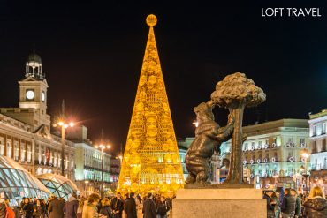 รูปปั้นหมี เกาะต้นสตรอเบอร์รี่ สัญลักษณ์ของเมือง มาดริด ประเทศสเปน Bear and the Madroño Tree, heraldic symbol of Madrid, Spain (Estatua del Oso y el Madroño)