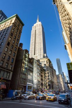 empire state building and new york yellow cab